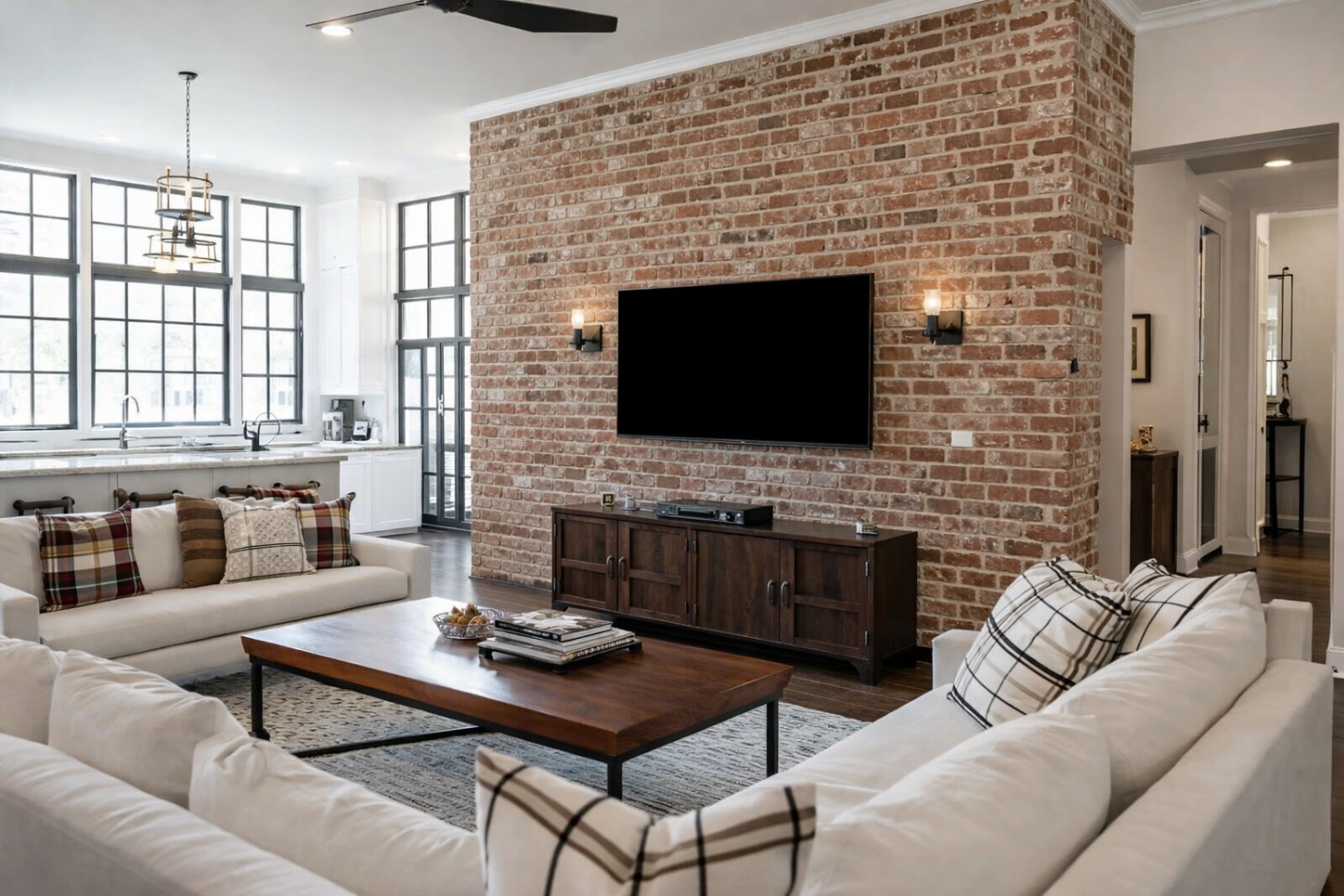 A living room with a brick wall and a televisionAI-generated content may be incorrect.